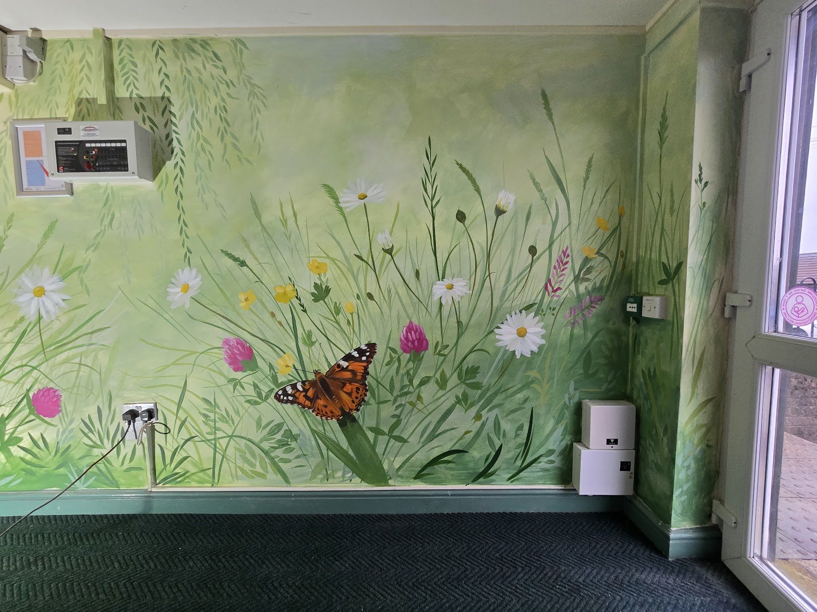Naturalistic mural painted in a Blaenau Gwent Flying Start centre